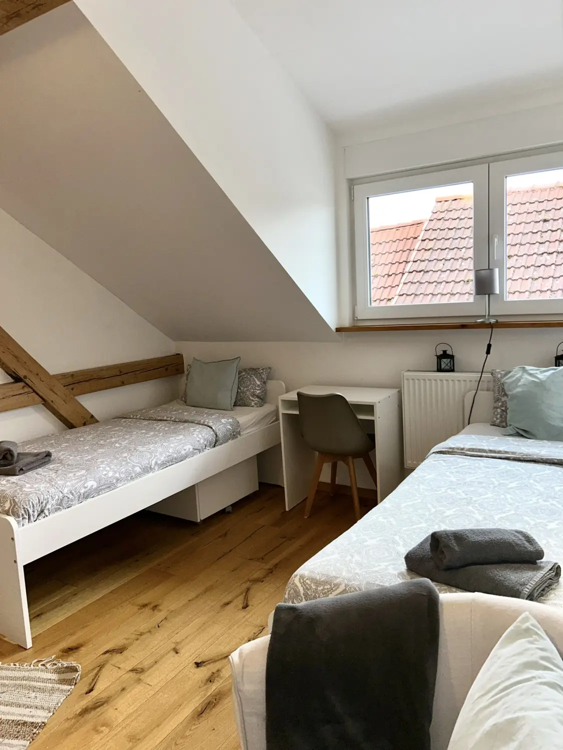 Ferienwohnung Schütz - Schlafzimmer mit Bett 