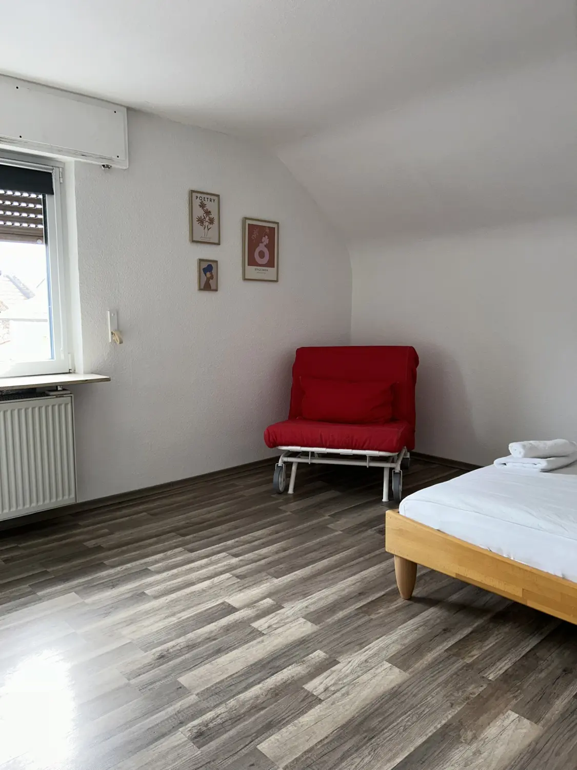 Ferienwohnung Schütz - Schlafzimmer mit Bett 